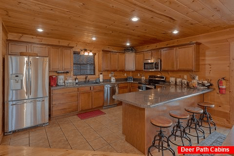 Full Kitchen with bar seating in 5 bedroom cabin - Amazing Views to Remember