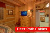 King bedroom with TV in Rustic cabin