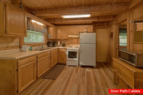 Full kitchen in 1 bedroom cabin - All By Grace