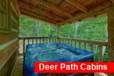 1 bedroom cabin with hot tub and wooded view