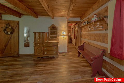 Master Bedroom with Chair and Flatscreen TV - Bear Cove Escape