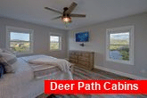 Cabin bedroom with King bed and mountain views