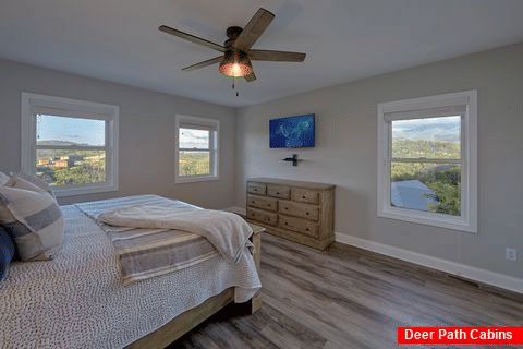 Cabin bedroom with King bed and mountain views - A Castle in the Clouds