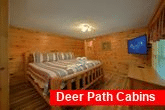 Queen bedroom with TV in Pigeon Forge cabin 