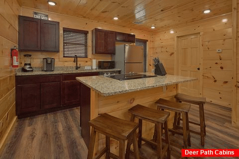 Kitchen with seating for 4 in 2 bedroom cabin - Laurel Splash