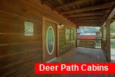 2 bedroom cabin with porch swing and Fire Pit