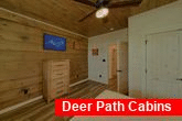 Master Bedroom with TV in 4 bedroom cabin rental