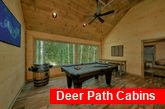 4 bedroom cabin game room with arcade games