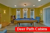 Pool table game room in 3 bedroom cabin rental