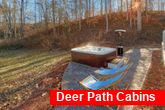 3 bedroom cabin with a hot tub and wooded view