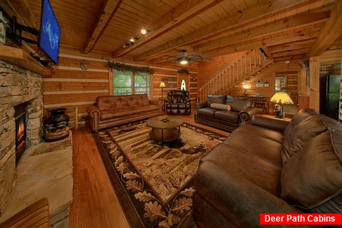 Living room with fireplace in 3 bedroom cabin - Dogwood Acre