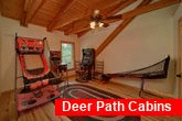 3 bedroom cabin with a game room and arcade game