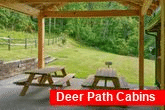 3 bedroom cabin with picnic tables and grill