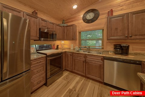 Furnished kitchen in 2 bedroom luxury cabin - Southern Magnolia