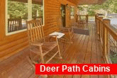 2 bedroom cabin with rocking chairs and fire pit