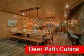 Spacious dining room in 12 bedroom cabin rental