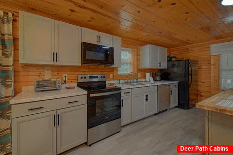 Fully furnished kitchen in 5 bedroom cabin - A Perfect Stay