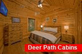 Cabin bedroom with King Bed and Wooded Views