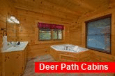 Cabin with Private Jacuzzi Tub in Master Bedroom