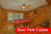 Pool table game room in 3 bedroom cabin rental