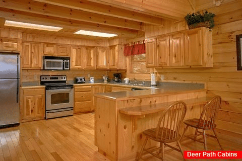 Spacious Kitchen with Bar Seating - Lucky Logs Lodge