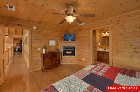 Cabin Master Bedroom with fireplace and TV - A Spectacular View to Remember